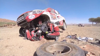 Here's Two-Time F1 World Champion Fernando Alonso Fixing His Own Broken Race Car